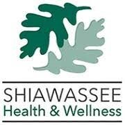 Shiawassee Health & Wellness logo two green oak leaves